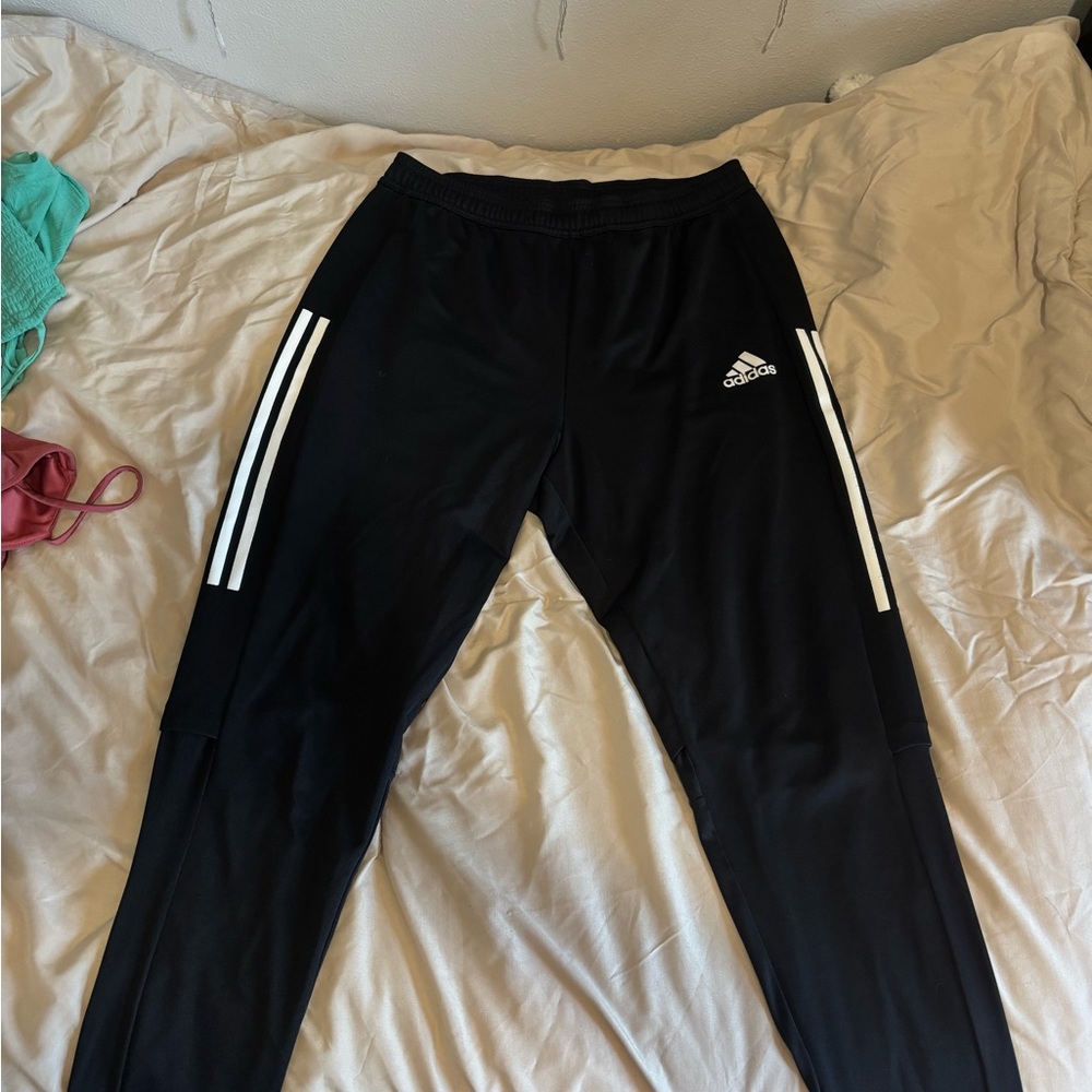 Adidas Black and White Track Pants with Iconic Stripes